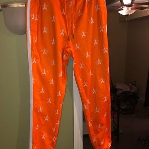 Jeffree Star track suit in bright orange small
